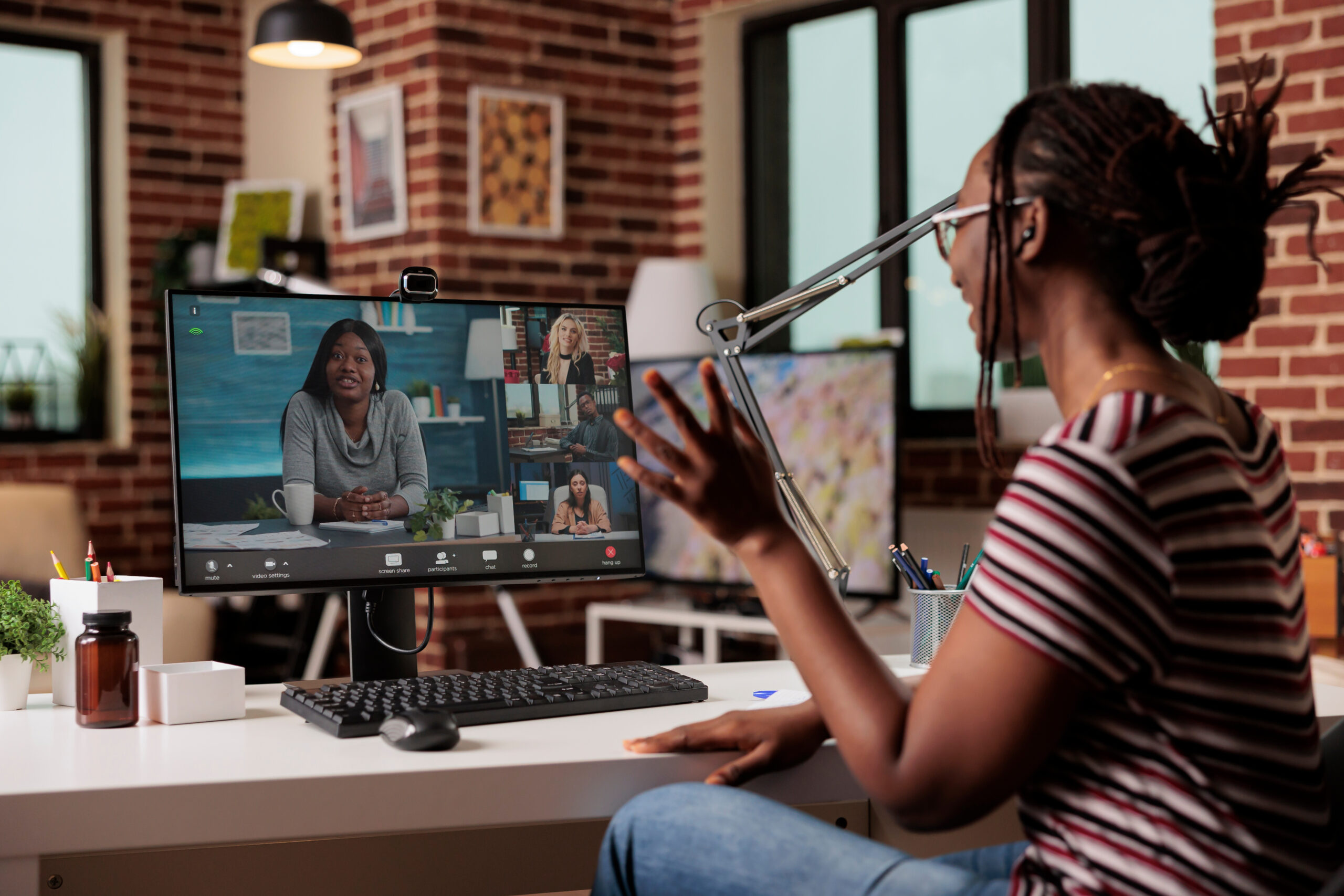 Employee chatting with remote team on video call Employee chatting with remote team on video call, freelancer working from home, attending videoconference. Woman talking on virtual meeting, telework, online brainstorming, teamwork concept
