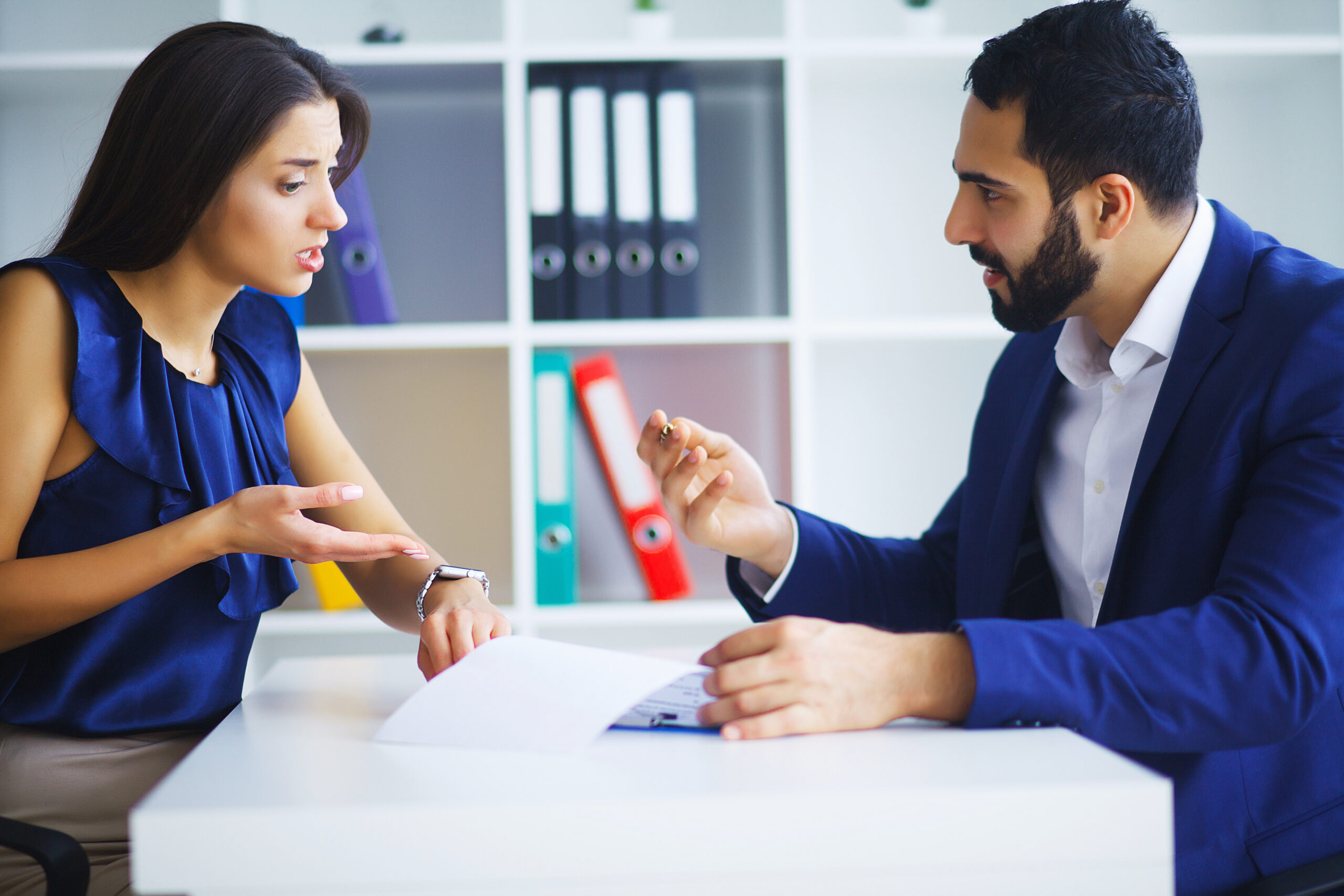 Business people conflict working problem, angry boss argue scream to colleague businessmen and women serious argument negative emotion discussing report meeting Two business people having a conflict over a document