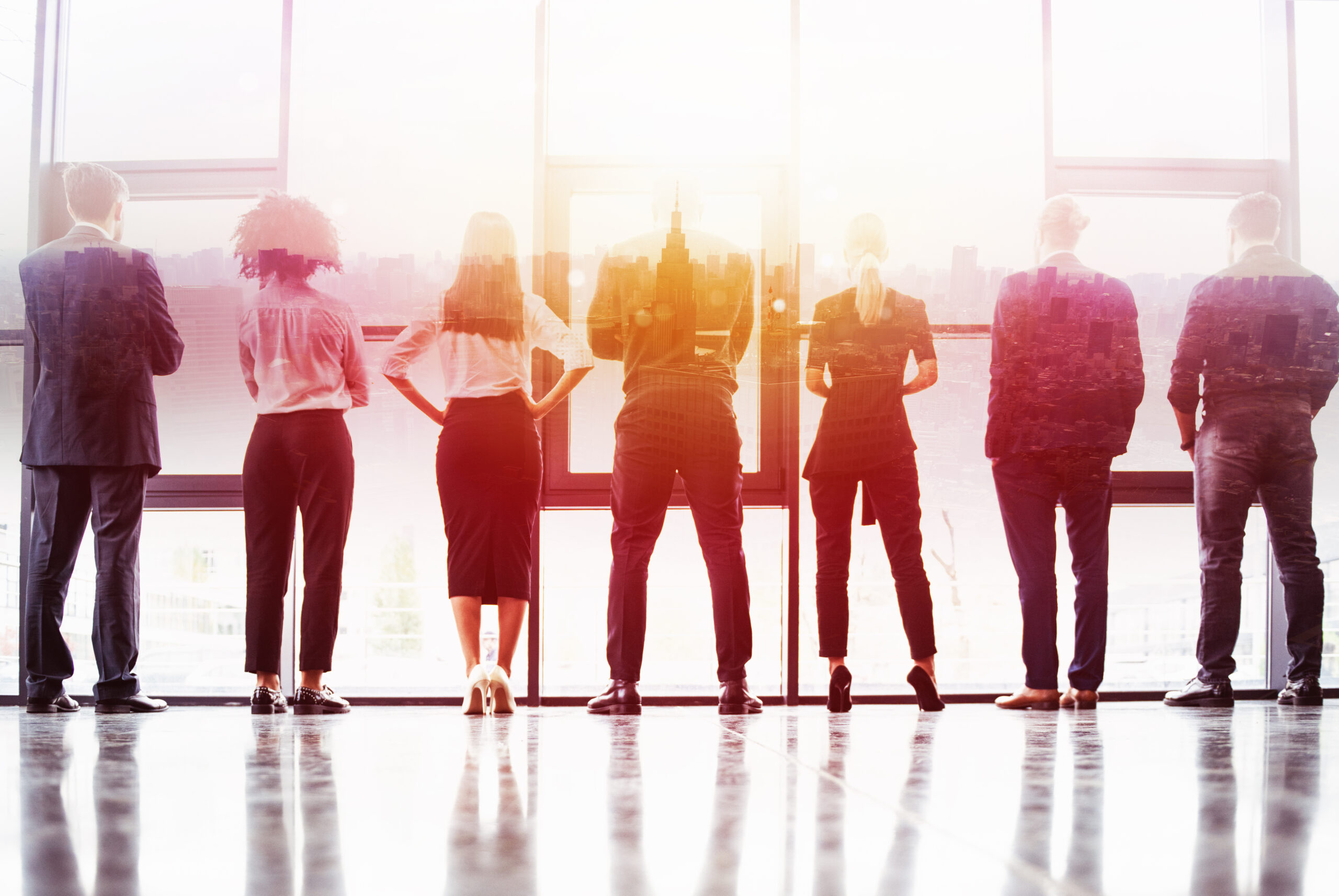 Business people looking at a city skyline