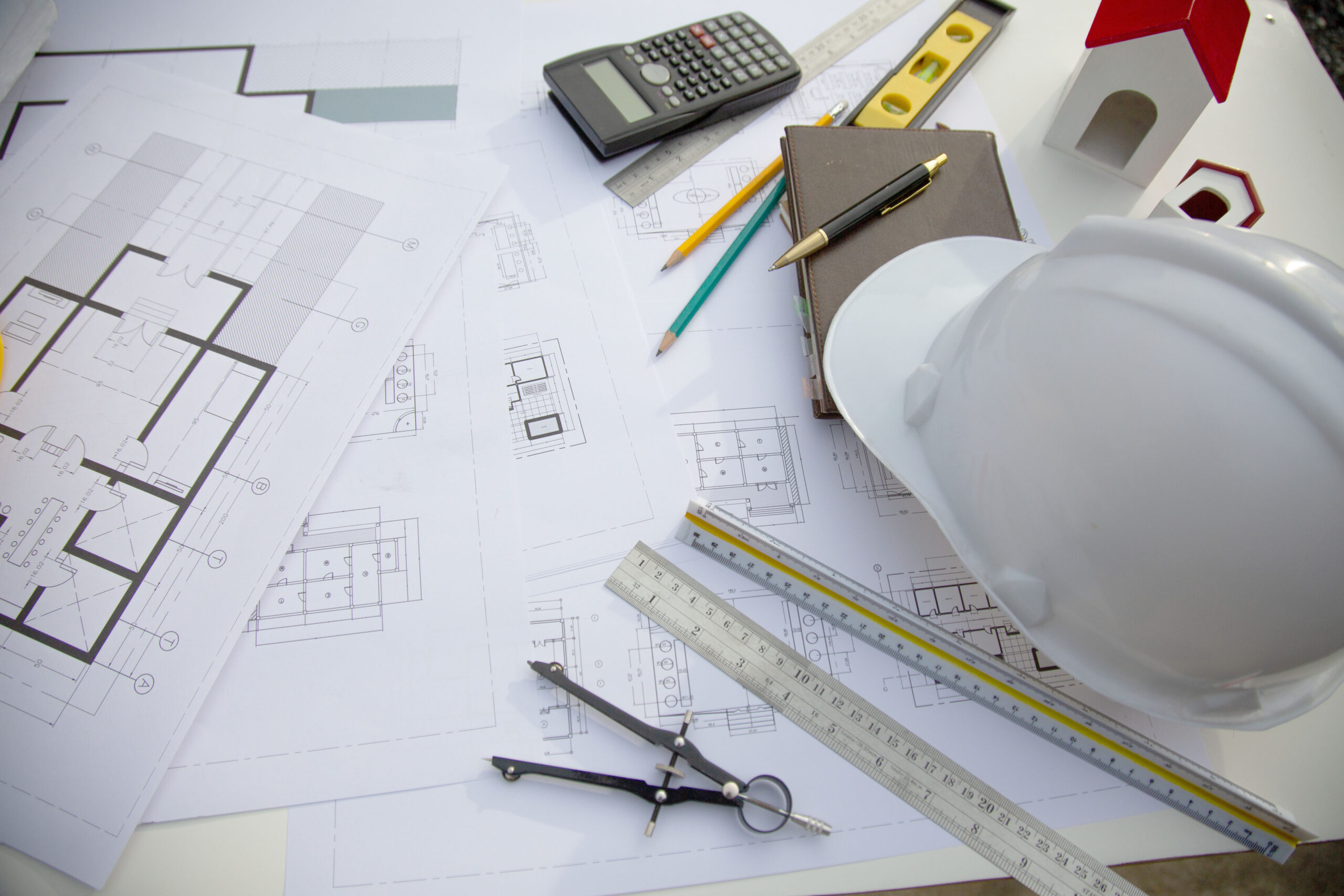 Desk of Architectural working project in construction site