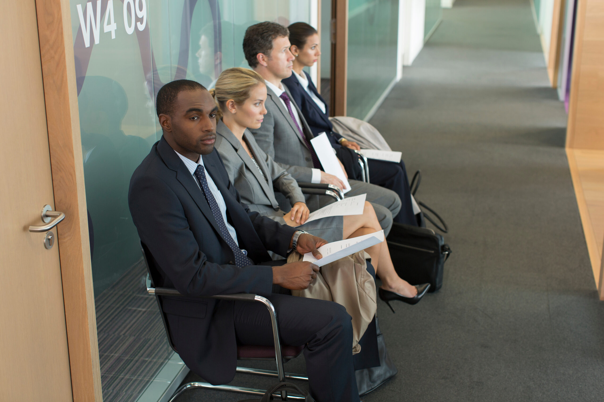 A group of candidates waiting to interview