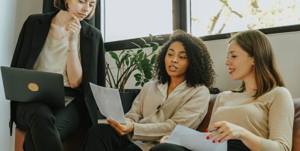 Three women having a business meeting