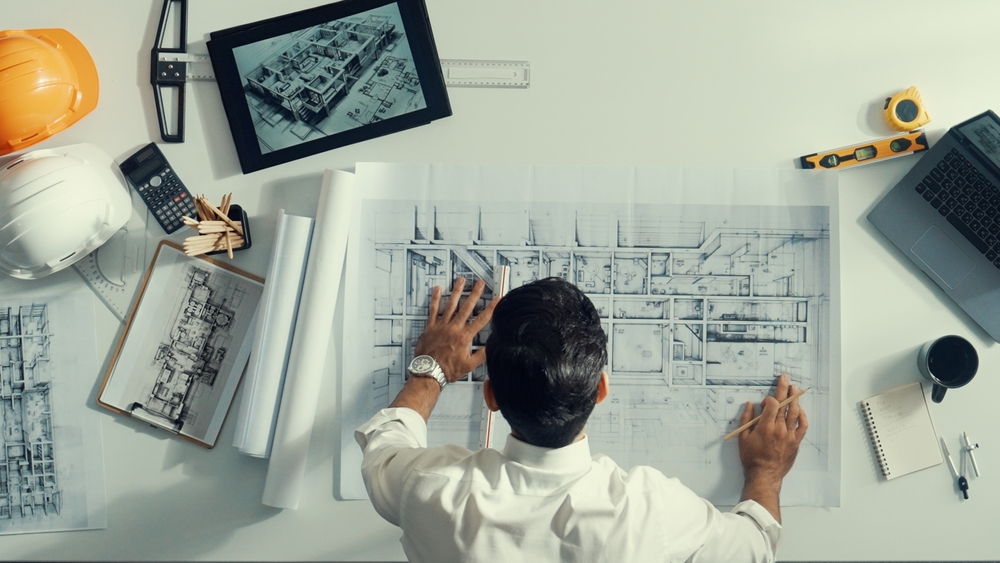 Top,View,Of,Skilled,Civil,Engineer,Sitting,And,Writing,Idea Top,View,Of,Skilled,Civil,Engineer,Sitting,And,Writing,Idea