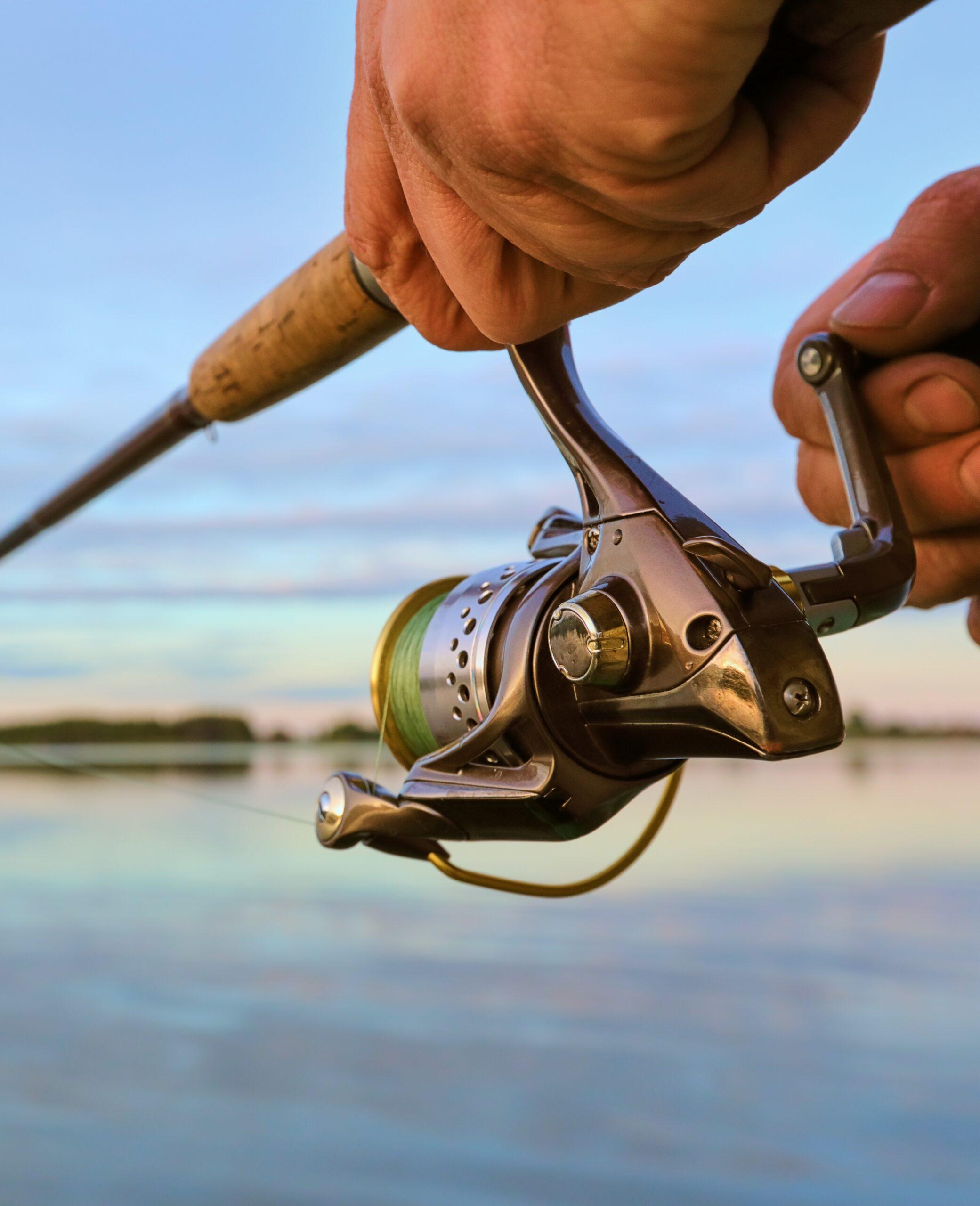 Fishing on the lake at sunset. Fishing background.